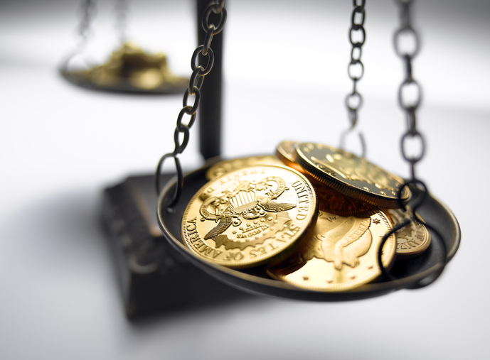 Gold drops 1.5% from Monday's peak