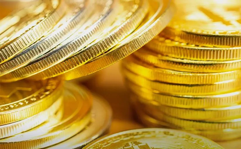 Ouro entre suporte chave e incerteza sobre juros